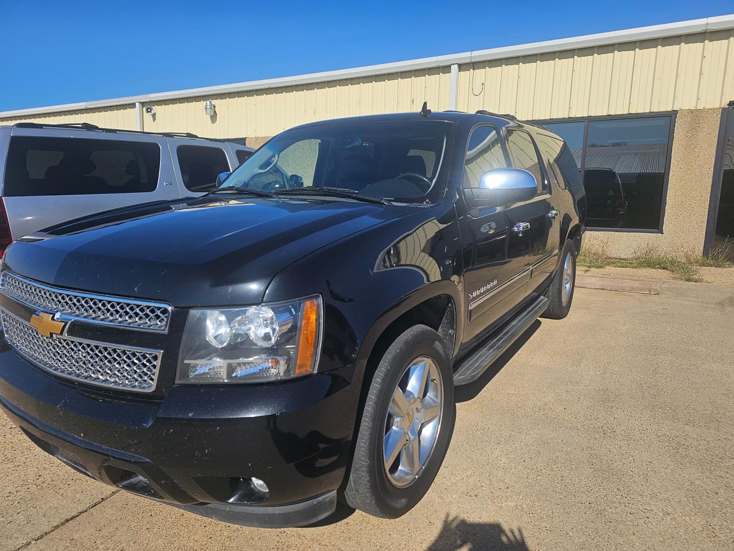 2012 BLACK Chevrolet Suburban LTZ 1500 (1GNSCKE0XCR) with an 5.3L V8 OHV 16V FFV engine, 6-Speed Automatic transmission, located at 533 S Seven Points BLVD, Seven Points, TX, 75143, (430) 255-4030, 32.313999, -96.209351 - Photo#0